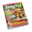 Titelbild der Zeitschrift „ZauberTopf – Lieblingsrezepte für Thermomix®“, Ausgabe Juni/Juli 2025, mit grünem Hintergrund im oberen Bereich und großflächigem Bild mehrerer Grillspieße mit Gemüse und Käse vor Holzoberfläche unten; sichtbare Titeltexte u. a.: „Grillspaß!“, „Erdbeer-Hits“, „Schichtsalate“, „Spargel“, „24 Seiten extra: Grill-Büfett für ALLE!“, „Für jeden was dabei“ sowie Thermomix-Produktbild links und lachende blonde Frau mit Thermomix unten links.