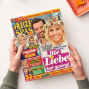 Titelblatt des Magazins „Freizeit Spass“ mit dem großen Schriftzug „Die Liebe hat gesiegt“ über einem Porträtfoto eines lächelnden Paares, rechts eine blonde Frau mit Blumenkranz, links ein Mann mit Bart; zusätzliche Schlagzeilen zu Promi-Themen, unter anderem „Psycho-Klinik“, „Barbara Schöneberger – Pikante Ehe-Beichte“ und „Karel Gott – Schönes Erbe“, bunte Gestaltung mit gelben, roten und pinken Textfeldern.