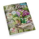 Titelbild der Zeitschrift „LandIDEE“, Ausgabe Mai/Juni 2025, mit grünem Gartentisch auf einer Wiese, darauf grüne Metallkanne mit Flieder- und weißen Blüten, daneben kleine Tontöpfe und Gartenhandschuhe. Aufschrift u. a.: „Bezaubernder Blütentraum im Sommer“, „284 Ideen für sonnige Tage“, Themen zu Balkonideen, Sommerrezepten mit Erbsen, kugelförmigen Blüten und Erdbeeren.
