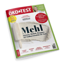 Titelbild der Zeitschrift „ÖKO-TEST“ mit grünem Rand und großer Überschrift „Mehl – Weizen, Dinkel, Roggen: 50 Vollkornmehle im Test“ vor einer Abbildung von ausgebreitetem Mehl und einem hölzernen Nudelholz. Weitere sichtbare Texte: „TEST 215 Produkte für jeden Tag“, „Nach den Toxin-Funden“, „Wettkampf der Mehle“, sowie kleinere Schlagzeilen über Ostereierfarben, Babybäder, Kräuter der Provence und Handspülmittel.