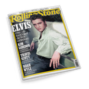 Magazin „Rolling Stone“, Ausgabe März 2016, mit gelbem Rahmen und schwarzer Titelaufschrift. Auf dem Cover sitzt ein männlicher Musiker in gestreiftem hellgrünem Hemd und dunkler Hose an einer Mauer, Blick in die Kamera. Textaufschriften: „ELVIS – 1956 – als Rock’n’Roll die Welt veränderte“, „KIM GORDON macht keine Kompromisse“, „TRAVIS SCOTT erschafft ein Rap-Imperium“, „NOAH WYLE ist der Arzt, dem wir vertrauen“, obere Zeile: „THIN LIZZY – MITSKI – PEACHES“.