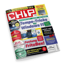 Schräg fotografierte CHIP-Computerzeitschrift mit weißem, rotem, gelbem, grünem und blauem Cover vor schwarzem Hintergrund. Sichtbare Überschriften sind „Tempo-Tricks für Windows 11“, „Festung FritzBox!“, „OpenClaw“, „Alle Videos gratis herunterladen“, „Arm-Chips: Power pur!“, „WLAN Security-Box“ und „INFO PROGRAMM gemäß §14 JuSchG“; abgebildet sind außerdem ein Laptop, eine CD und mehrere Softwareverpackungen.