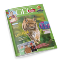 Grün umrandetes Magazin „GEOlino“ mit großem Foto eines Luchses in Bewegung vor unscharfem Waldhintergrund. Textaufschriften: „Luchse – Zurück in unseren Wäldern“, „Checker Tobi“, „Vulkane – Wenn die Erde Feuer spuckt“, „Auf der Balz“ sowie UNICEF-Logo unten rechts. Kleine Fotoeinblendung unten zeigt drei lachende Jungen vor Bergkulisse in Freizeitkleidung.