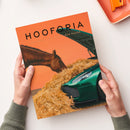 Orangefarbenes Magazin mit dem Titel „HOOFORIA“ und der Aufschrift „
